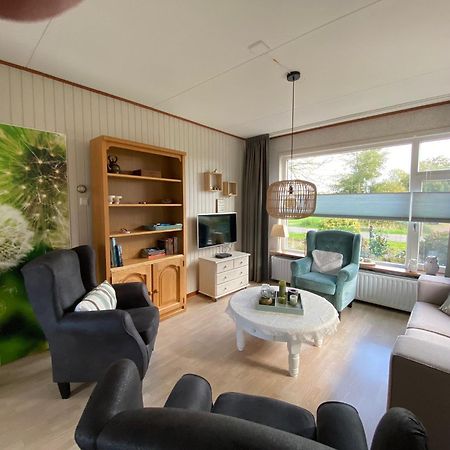 Huis Bij Het Water Met Sloepje Jutrijp Экстерьер фото