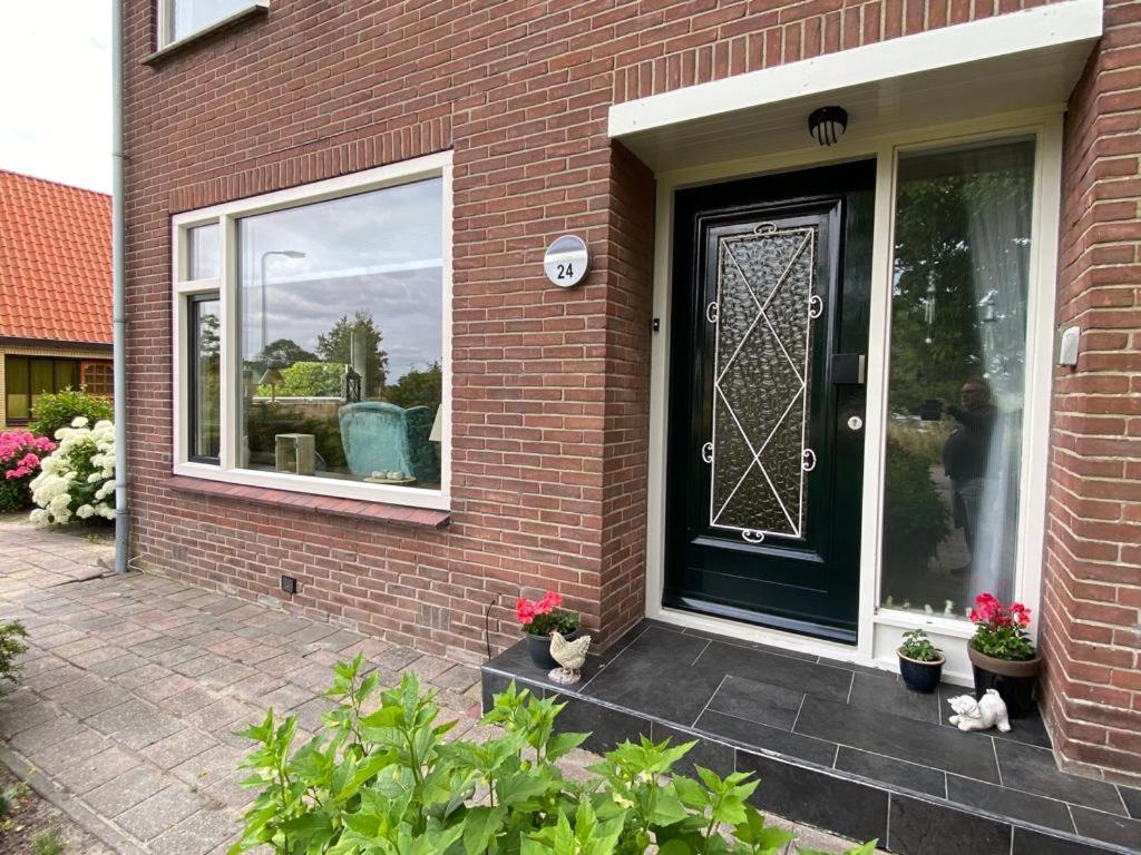 Huis Bij Het Water Met Sloepje Jutrijp Экстерьер фото